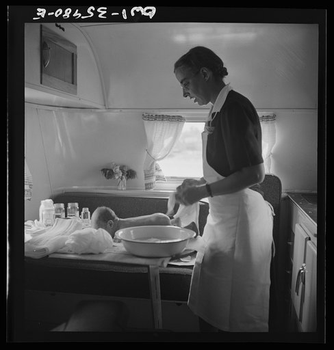 Untitled photo, possibly related to: Middle River, a small crossroads in the vicinity of Baltimore, Maryland. FSA (Farm Security Administration) housing project (later administered by the National Housing Agency) for Glenn L. Martin aircraft workers. Mrs. Phyllis Phair, a public health nurse, demons