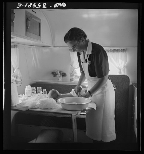 Untitled photo, possibly related to: Middle River, a small crossroads in the vicinity of Baltimore, Maryland. FSA (Farm Security Administration) housing project (later administered by the National Housing Agency) for Glenn L. Martin aircraft workers. Mrs. Phyllis Phair, a public health nurse, demons