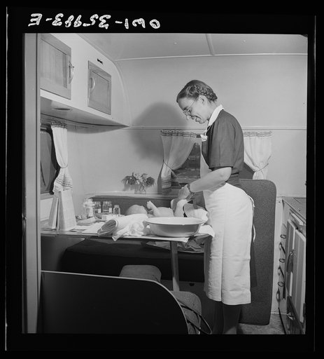 Middle River, a small crossroads in the vicinity of Baltimore, Maryland. FSA (Farm Security Administration) housing project (later administered by the National Housing Agency) for Glenn L. Martin aircraft workers. Mrs. Phyllis Phair, a public health nurse, demonstrating to a young mother how to bath