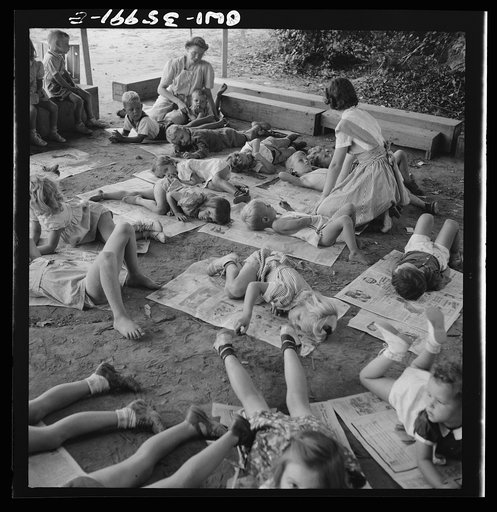 Middle River, a small crossroads in the vicinity of Baltimore, Maryland. FSA (Farm Security Administration) housing project (later administrated by the National Housing Agency) for Glenn L. Martin aircraft workers. Children at rest in the playground