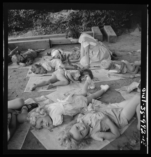 Untitled photo, possibly related to: Middle River, a small crossroads in the vicinity of Baltimore, Maryland. FSA (Farm Security Administration) housing project (later administrated by the National Housing Agency) for Glenn L. Martin aircraft workers. Children at rest in the playground