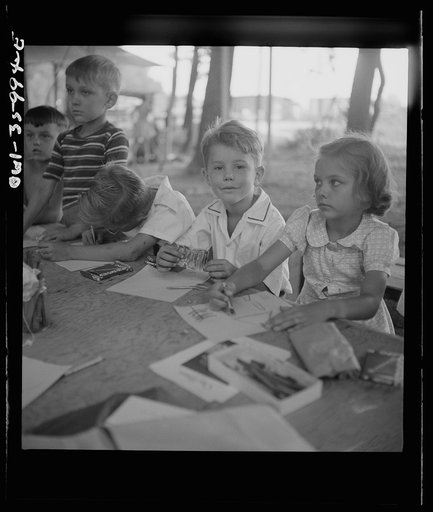 Untitled photo, possibly related to: Middle River, a small crossroads in the vicinity of Baltimore, Maryland. FSA (Farm Security Administration) housing project (later administered by the National Housing Agency) for Glenn L. Martin aircraft workers. Children attending Bible class
