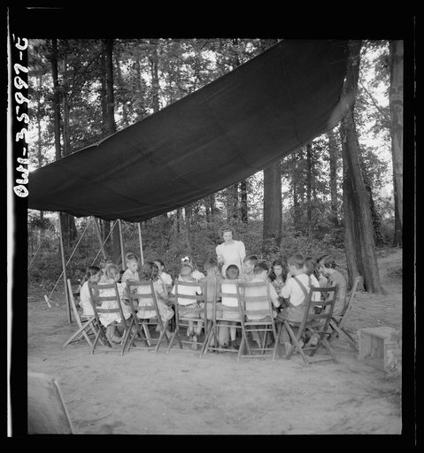 Middle River, a small crossroads in the vicinity of Baltimore, Maryland. FSA (Farm Security Administration) housing project (later administered by the National Housing Agency) for Glenn L. Martin aircraft workers. Daily Bible class conducted for the children at the Glenn L. Martin trailer camp