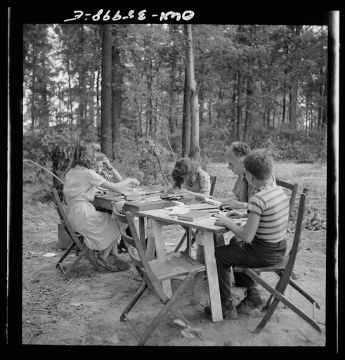 Untitled photo, possibly related to: Middle River, a small crossroads in the vicinity of Baltimore, Maryland. FSA (Farm Security Administration housing project (later administered by the National Housing Agency) for Glenn L. Martin aircraft workers. Children attending daily Bible class under the dir