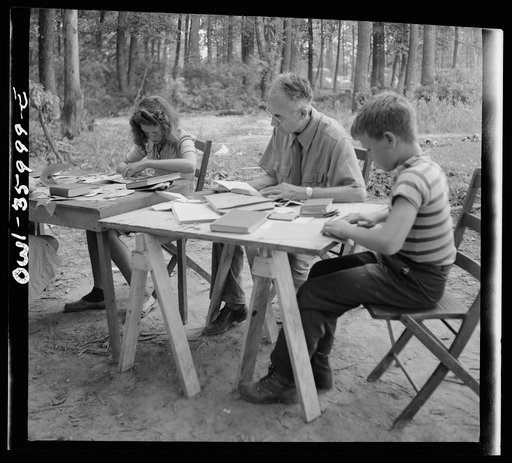Untitled photo, possibly related to: Middle River, a small crossroads in the vicinity of Baltimore, Maryland. FSA (Farm Security Administration housing project (later administered by the National Housing Agency) for Glenn L. Martin aircraft workers. Children attending daily Bible class under the dir