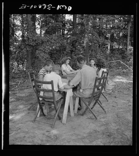Middle River, a small crossroads in the vicinity of Baltimore, Maryland. FSA (Farm Security Administration) housing project (later administered by the National Housing Agency) for Glenn L. Martin aircraft workers. Children attending daily Bible class in their daily rest period, under the direction o