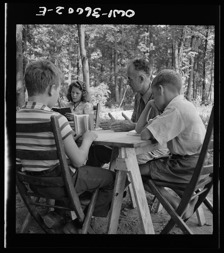 Middle River, a small crossroads in the vicinity of Baltimore, Maryland. FSA (Farm Security Administration) housing project (later administered by the National Housing Agency) for Glenn L. Martin aircraft workers. Children attending daily Bible class in their daily rest period, under the direction o