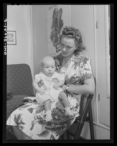 Middle River, Maryland. FSA (Farm Security Administration) housing project (later administered by the National Housing Agency) for Glenn L. Martin aircraft workers. Mrs. George Davis with her child in the well baby clinic