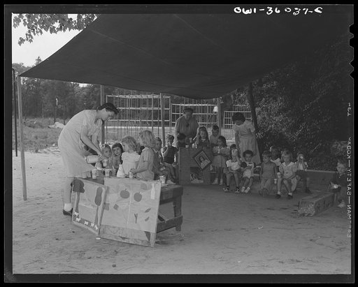 Untitled photo, possibly related to: Middle River, a small crossroads in the vicinity of Baltimore, Maryland. FSA (Farm Security Administration) housing project (later administered by the National Housing Agency) for Glenn L. Martin aircraft workers. Daily Bible class conducted for the children at t