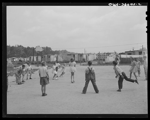 Middle River, a small crossroads in the vicinity of Baltimore, Maryland. FSA (Farm Security Administration) housing project (later administered by the National Housing Agency) for Glenn L. Martin aircraft workers. Children who attend summer Bible class playing in their recreation period