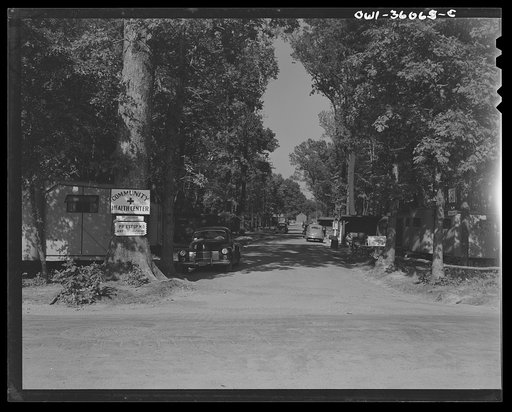 Untitled photo, possibly related to: Middle River, Maryland. FSA (Farm Security Administration) housing project for Glenn L. Martin aircraft workers. A road through the trailer colony