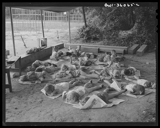 Middle River, a small crossroads in the vicinity of Baltimore, Maryland. FSA (Farm Security Administration) housing project (later administered by the National Housing Agency) for Glenn L. Martin aircraft workers. Children resting at the playground