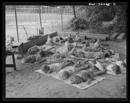 Untitled photo, possibly related to: Middle River, a small crossroads in the vicinity of Baltimore, Maryland. FSA (Farm Security Administration) housing project (later administered by the National Housing Agency) for Glenn L. Martin aircraft workers. Children resting at the playground