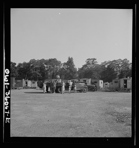 Middle River, a small crossroads in the vicinity of Baltimore, Maryland. FSA (Farm Security Administration) housing project (later administered by the National Housing Agency) for Glenn L. Martin aircraft plant workers. Produce trucks