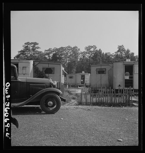 Untitled photo, possibly related to: Middle River, Maryland. FSA (Farm Security Administration) housing project for Glenn L. Martin aircraft plant workers. Scene in the rear of the houses