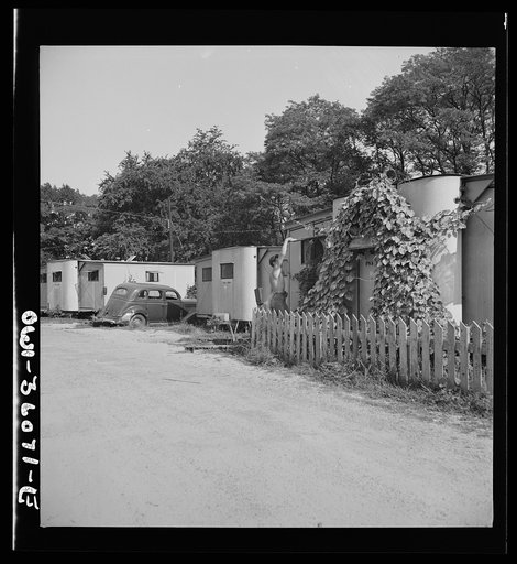 Middle River, a small crossroads in the vicinity of Baltimore, Maryland. FSA (Farm Security Administration) housing project for Glenn L. Martin aircraft workers. Vine-covered entrance to trailer