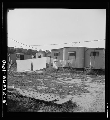 Middle River, a small crossroads in the vicinity of Baltimore, Maryland. FSA (Farm Security Administration) housing project (later administered by the National Housing Agency) for Glenn L. Martin Aircraft Plant workers. Back of the trailers, with a wash hanging on a line