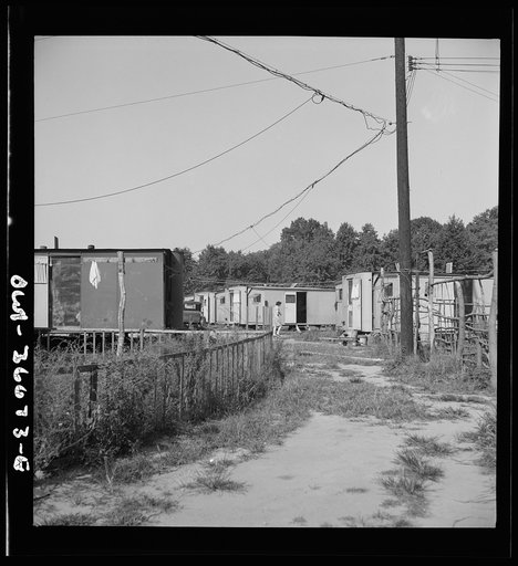 Middle River, a small crossroads in the vicinity of Baltimore, Maryland. FSA (Farm Security Administration) housing project (later administered by the National Housing Agency) for Glenn L. Martin Aircraft Plant workers. Backyard scenes