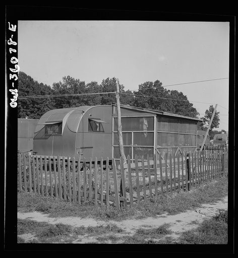 Middle River, Maryland. FSA (Farm Security Administration) housing project for Glenn L. Martin aircraft plant workers. A trailer in a small enclosed yard