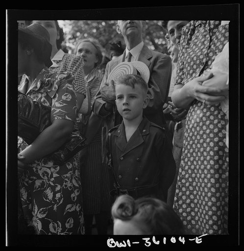 Washington, D.C. Spectators at the parade to recruit civilian defense workers
