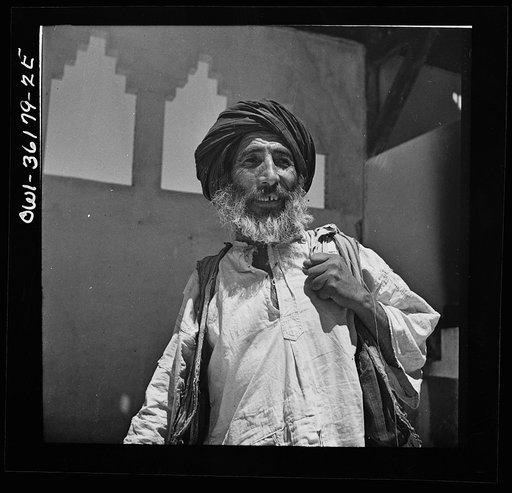 Mejex-El-Bab, Tunisia. A market operated by the Allied civilian relief groups to sell at cost food, clothing, kerosene, etc., supplied by the U.S. Office of Foreign Relief and Rehabilitation Operations to natives and Europeans, victims of war deprivation
