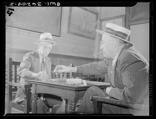 Gloucester, Massachusetts. Playing cribbage in the Master Mariner's Association, whose members have been captains on fishing vessels