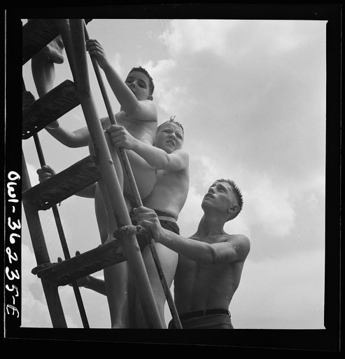 Glen Echo, Maryland. Climbing the ladder to the sliding board at the swimming pool