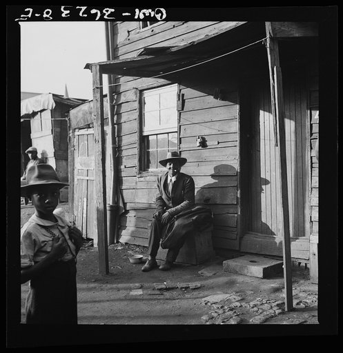Washington, D.C. Negroes in front of their alley dwellings near the capitol