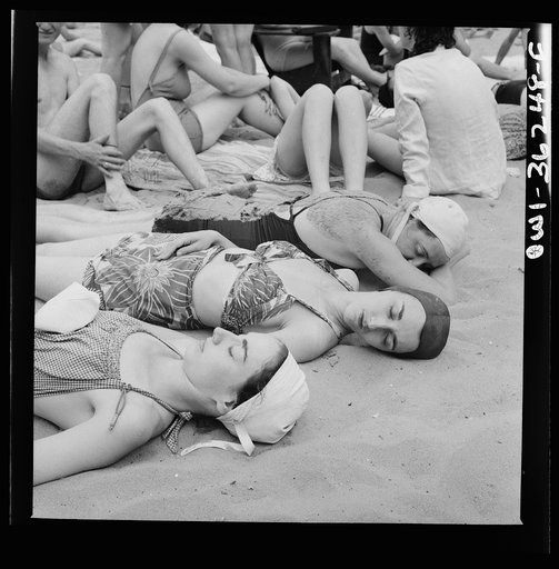 Glen Echo, Maryland. Sun bathers on the sand beach at the swimming pool in the Glen Echo amusement park