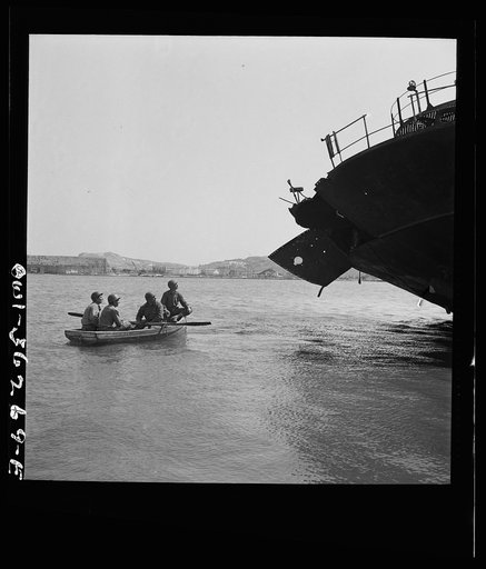 Tunis, Tunisia. American soldiers inspecting wrecked ships in Tunis harbor