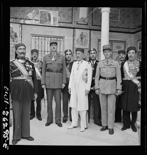 Carthage, Tunisia. General de Gaulle, the Bey of Tunis and General Mast in the courtyard of the bey's summer palace