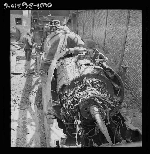 Untitled photo, possibly related to: La Goulette, Tunisia. Wrecked turbine which formerly provided electric power for the entire Tunis area. Only one of the turbines is still running
