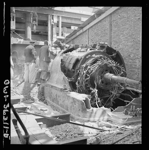 Untitled photo, possibly related to: La Goulette, Tunisia. Wrecked turbine which formerly provided electric power for the entire Tunis area. Only one of the turbines is still running