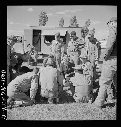 Untitled photo, possibly related to: Constantine (vicinity), Algeria. Red Cross clubmobile serving refreshments to an anti-aircraft gun crew stationed in an outlying post