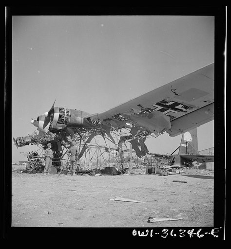 Tunis, Tunisia. Wreckage of a Messerschmitt 323 at El Aouiana airport. This six-engine troop transport, one of the largest planes made, was designed to carry 140 fully-equipped troops and was used by the Germans in their unsuccessful attempts to reinforce their army in Africa