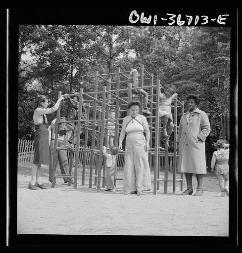 Untitled photo, possibly related to: Arden, New York. Interracial activities at Camp Ellen Marvin, where children are aided by the Methodist Camp Service. Mothers supervising their children who are playing in a jungle gym