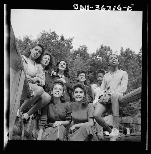 Arden, New York. Interracial activities at Camp Gaylord White, where children are aided by the Methodist Camp Service. Campers singing the "Ballad for Americans"
