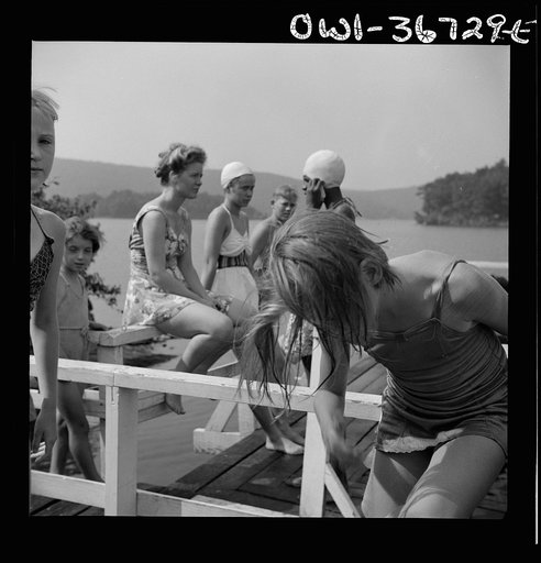 Haverstraw, New York. Interracial activities at Camp Christmas Seals, where children are aided by the Methodist Camp Service. Sun bathing on Lake Tiorati