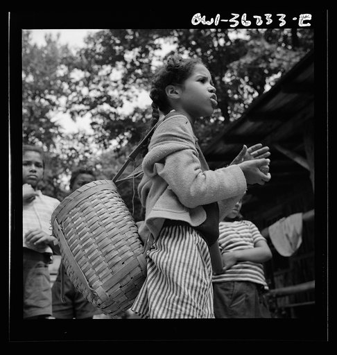 Bear Moutain, New York. Interracial activities at Camp Fern Rock, where children are aided by the Methodist Camp Service. Michailyn calling her buddie Marie