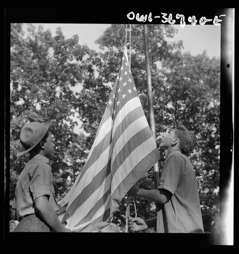 Southfields, New York. Interracial activities at Camp Nathan Hale, where children are aided by the Methodist Camp Service. Raising Old Glory