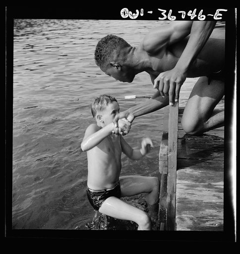 Southfields, New York. Interracial activities at Camp Nathan Hale, where children are aided by the Methodist Camp Service. A scene at the swimming dock