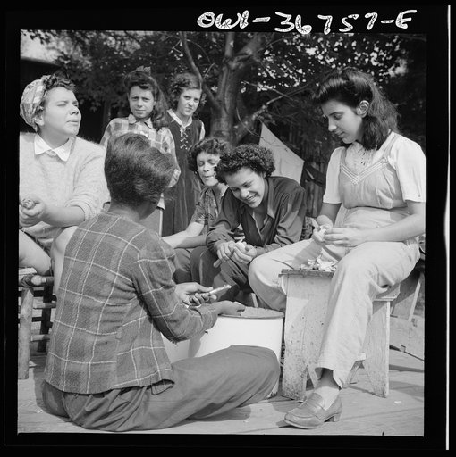 Arden, New York. Interracial activities at Camp Gaylord White, where children are aided by the Methodist Camp Service. Campers peeling potatoes