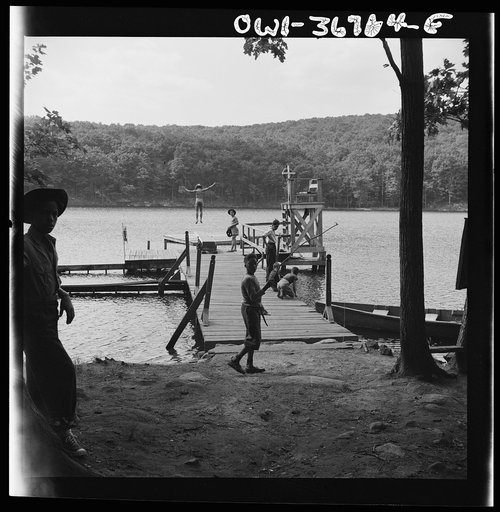 Southfields, New York. Interracial activities at Camp Nathan Hale, where children are aided by the Methodist Camp Service. A view of the lake and swimming activities