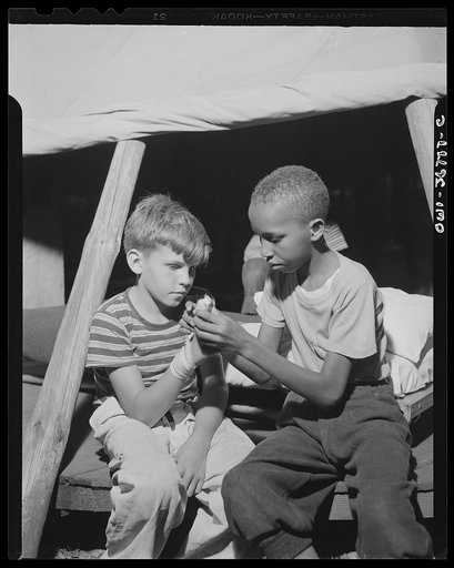 Southfields, New York. Interracial activities at camp Nathan Hale, where children are aided by the Methodist Camp Service. First aid