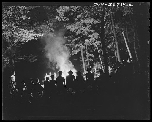 Southfields, New York. Interracial activities at camp Nathan Hale, where children are aided by the Methodist Camp Service. Campers of the Methodist Camp Service and other organizations singing around the camp fire