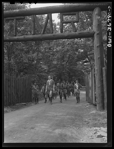 Tusten, New York. Interracial activities at Camp Brooklyn, where children are aided by the Methodist Camp Service. Boy Scout troop no. 763 of New York City, with the camp leader, Peter Jung