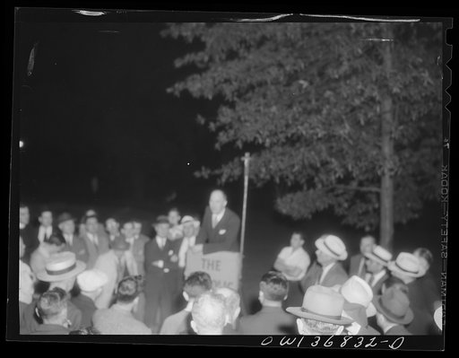 Untitled photo, possibly related to: Washington, D. C. Director of the USO (United Service Organizations) addressing a Catholic Evidence Guild rally in Franklin Park