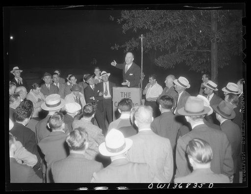 Washington, D. C. Director of the USO (United Service Organizations) addressing a Catholic Evidence Guild rally in Franklin Park