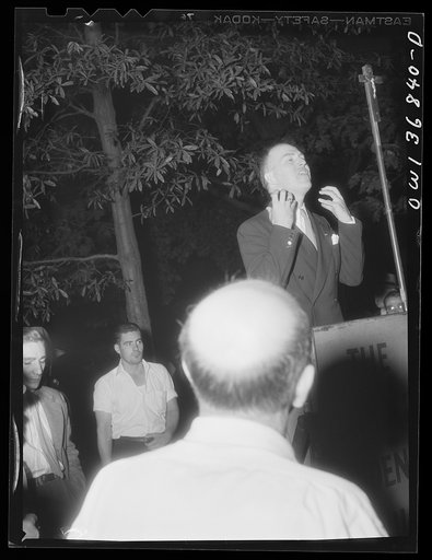 Washington, D. C. Director of the USO (United Service Organizations) addressing a Catholic Evidence Guild rally in Franklin Park