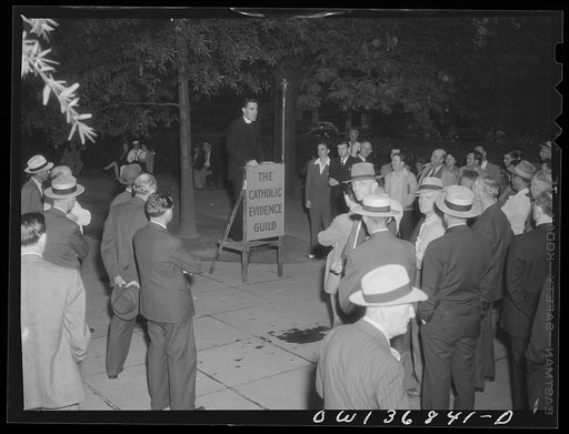 Untitled photo, possibly related to: Washington, D. C. Director of the USO (United Service Organizations) addressing a Catholic Evidence Guild rally in Franklin Park